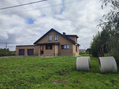 Дом из керамических блоков облицованный кирпичом